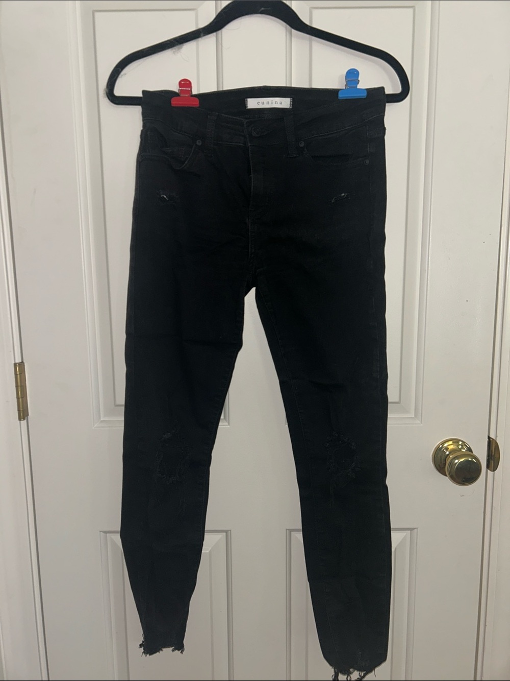 Black Skinny Jeans with Distressed Hem